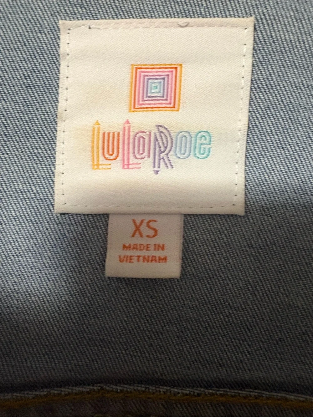 LuLaRoe Blue Denim Women's Jacket with Orange & Red Patterned Panel